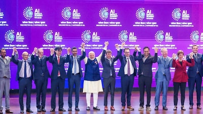 Prime Minister Narendra Modi joins hands with Google CEO Sundar Pichai, OpenAI CEO Sam Altman and others during the India AI Impact Summit 2026. (PTI)
