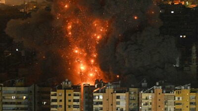 A fireball rises from the site of an Israeli airstrike that targeted an area in Beirut’s southern suburbs overnight March 10 to 11, 2026. (Image: AFP)