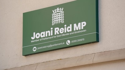 Signage at the constituency office of Joani Reid at Jacobean House in East Kilbride, Scotland. (Jane Barlow/PA via AP)