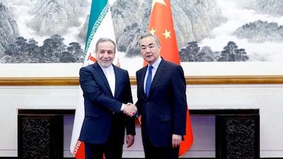 China's Wang Yi with Iranian counterpart Abbas Araghchi. (File image via X)