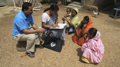 Census officials collecting data from the general public, circa 2011. (Image Courtesy: Indian Express/Reuters)