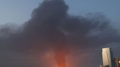 Plume of black smoke ascends following an explosion in the Fujairah industrial zone. (File Photo)