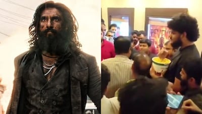 A fight during a Dhurandhar 2 screening goes viral as a man calmly watches the chaos while enjoying popcorn.