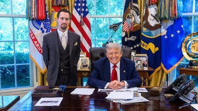 EJ Antoni (left) in the Oval Office with US President Donald Trump.