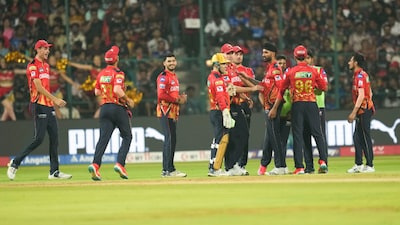Harpreet Brar celebrates a wicket with Punjab Kings teammates in the IPL (PTI)