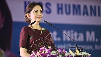 Nita Ambani embraces quiet luxury in a maroon silk saree with minimal jewellery as she attends the KISS Humanitarian Award 2025 in Bhubaneswar.