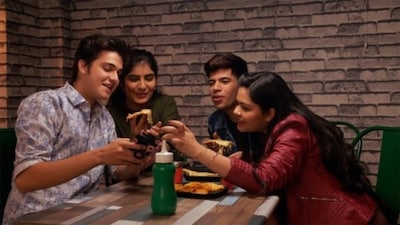 Young diners are increasingly gravitating toward cafés and restaurants that offer authentic, unfiltered experiences over perfectly curated settings, reflecting the growing ‘frictionmaxxing’ trend.