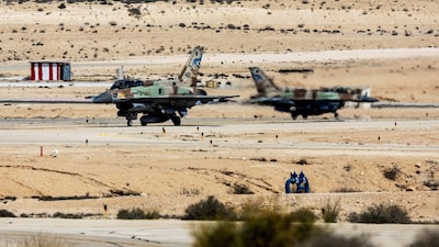 A view shows Israeli F-16 fighter jets on a runway in an airbase in southern Israel as the Israeli military threatens more airstrikes on Iran. (IMAGE: REUTERS)