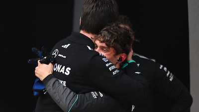 Mercedes' Toto Wolff and Kimi Antonelli share a moment after the Italian's maiden Grand Prix win at Shanghai (X)