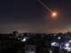 A missile launched from Iran is pictured in the sky from the Bureij camp for Palestinian refugees in the central Gaza Strip on March 1 (AFP)