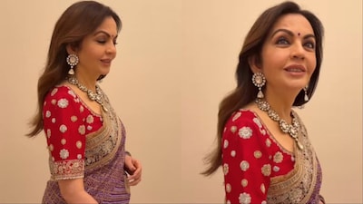 Nita Ambani stuns in a regal purple saree.