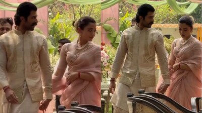 Rashmika Mandanna’s soft romantic saree meets Vijay Deverakonda’s regal minimalism.