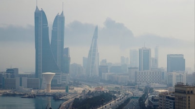 Smoke rises following a reported Iranian drone strike on the fuel storage facility of Bahrain International Airport (Photo: Reuters)