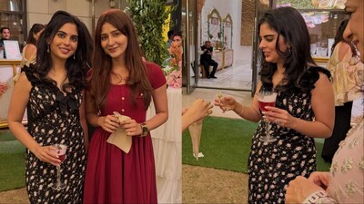 Isha Ambani stuns in a romantic floral midi dress.