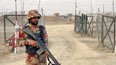  An army soldier stands guard at a deserted entry point at the Friendship Gate, following the exchanges of fire between Pakistan and Afghanistan forces, at the border crossing between the two countries, in Chaman, Pakistan. (IMAGE: REUTERS) 