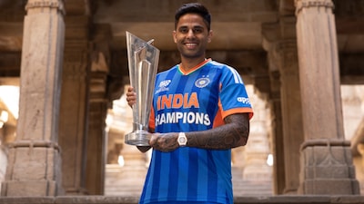 Suryakumar Yadav posing with the ICC Men's T20 World Cup trophy (X/ICC)