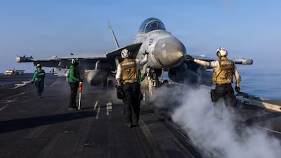An EA-18G Growler electronic warfare aircraft prepares to launch from the flight deck of the US Navy Nimitz-class aircraft carrier USS Abraham Lincoln in support of the Operation Epic Fury attack on Iran from an undisclosed location. (IMAGE: REUTERS) 
