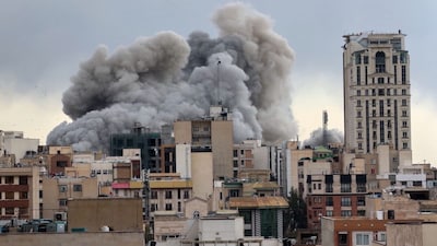  A plume of smoke rises after a strike in Tehran, Iran. (AP/File)