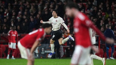 Midtjylland's Gue-Sung Cho celebrates scoring their side's first goal of the game during the Europa League round of sixteen, first leg soccer match between Nottingham Forest and FC Midtjylland in Nottingham, England, Thursday March 12, 2026. (Martin Rickett/PA via AP)
