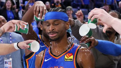 Oklahoma City Thunder players pour water on Thunder guard Shai Gilgeous-Alexander after an NBA basketball game against the Boston Celtics, Thursday, March 12, 2026, in Oklahoma City. (AP Photo/Nate Billings)