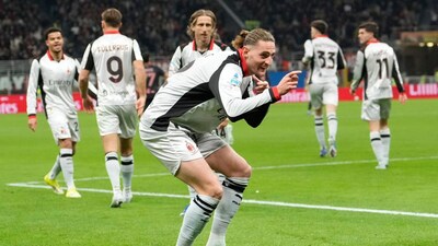 AC Milan's Adrien Rabiot celebrates scoring his side's 2nd goal during the Serie A soccer match between AC Milan and Torino, in Milan, Italy, Saturday, March 21, 2026. (AP Photo/Luca Bruno)