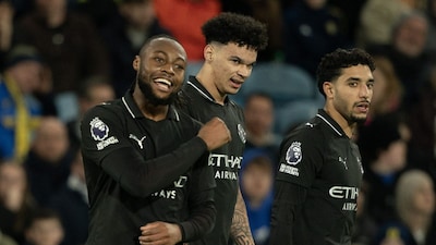 Manchester City's Antoine Semenyo, left, reacts after scoring during the Premier League soccer match between Leeds United and Manchester City in Leeds, England, Saturday, Feb. 28, 2026. (AP Photo/Ian Hodgson)