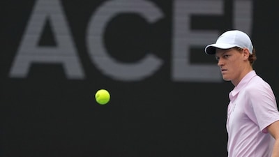 Jannik Sinner of Italy walks on the court after serving an ace against Jiri Lehecka of the Czech Republic in the men's singles final at the Miami Open tennis tournament, Sunday, March 29, 2026, in Miami Gardens, Fla. (AP Photo/Rebecca Blackwell)