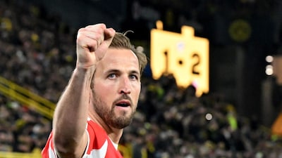 Bayern Munich's Harry Kane celebrates scoring during the Bundesliga soccer match between Borussia Dortmund and FC Bayern Munich in Dortmund, Germany, Saturday Feb. 28, 2026. (Federico Gambarini/dpa via AP)