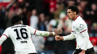 Jarell Quansah celebrates with Axel Tape after scoring his team's first goal agaisnt FSV Mainz 05 (Picture credit: AP)