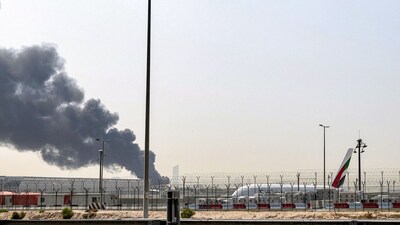 Smoke rises from an ongoing fire near Dubai International Airport in Dubai. (Image: AFP)