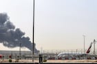 Smoke rises from an ongoing fire near Dubai International Airport in Dubai. (Image: AFP)