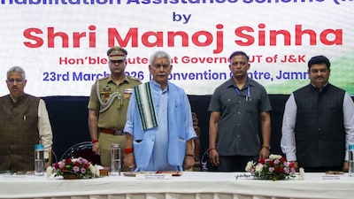 Jammu and Kashmir L-G Manoj Sinha during the handing-over ceremony of appointment orders under SRO 43 (Victims of Terror) and Rehabilitation Assistance Scheme (RAS), in Jammu on March 23, 2026. (Image: PTI)