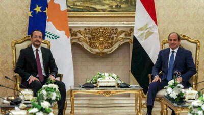 Cyprus' President Nikos Christodoulides with Egypt's President Abdel Fattah al-Sisi at al-Manara International Conference Centre in Cairo on Monday. (Image" AFP)