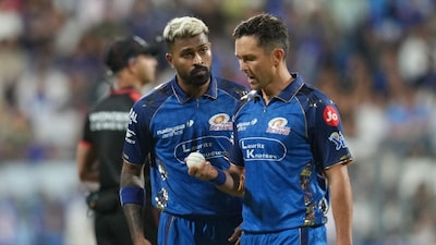 Hardik Pandya talks with Trent Boult (Picture credit: AP)