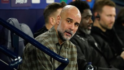 Pep Guardiola watches from the bench (Picture credit: AP)