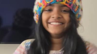 The girl sings along with ease, matches the vibe of the track.