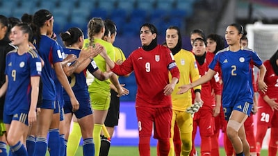 Zahra Ghanbari gestures to the Philippines players following the Women's Asian Cup game (Picture credit: AP)