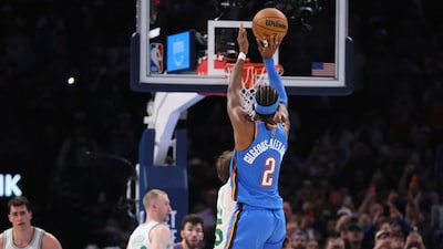 Shai Gilgeous-Alexander shoots a 2-point basket to break Wilt Chamberlain's 20-point streak record (Picture credit: AP)