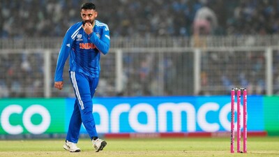 Varun Chakravarthy in action  [Photo: AP]