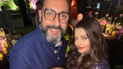 Aishwarya and Abhishek twin in royal blue.