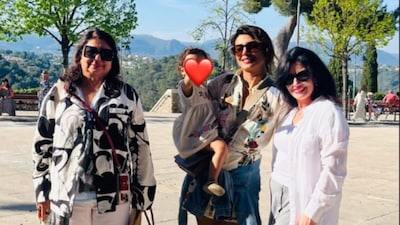 The picture also featured Nick and Priyanka’s pet dog, Diana.