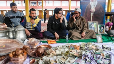 People collect donations at a religious centre to provide aid for war-hit victims of the Iran crisis, in Budgam district, Jammu and Kashmir. (PTI photo)
