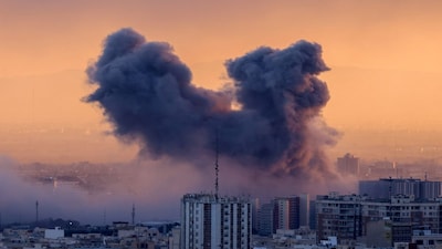 A plume of smoke rises after a strike on the Iranian capital Tehran, on March 3, 2026. (Photo: AFP)