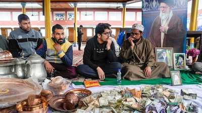 People collect donations at a religious centre to provide aid for war-hit victims of the Iran crisis, in Budgam district, Jammu and Kashmir, Monday, March 23, 2026. (Image: PTI)