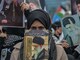 A protestor holds a portrait of Ayatollah Ali Khamenei during a demonstration against the US and Israel attack of Iran and the killing of the Supreme leader in front of Israel Consulate in Istanbul. (AFP)