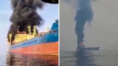 Smoke billows out from a Palau-flagged oil tanker with 15 Indian crew members after it came under attack from the Iranian military off Oman's Musandam peninsula. (PTI)