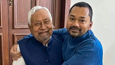 Bihar Chief Minister Nitish Kumar with his son Nishant Kumar at his official residence in Patna. (PTI file photo)
