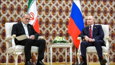 Iranian President Masoud Pezeshkian with Russian President Vladimir Putin. (Reuters)