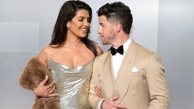Priyanka Chopra Shines in Silver, Nick Jonas Stuns in Beige – Oscar Afterparty Looks