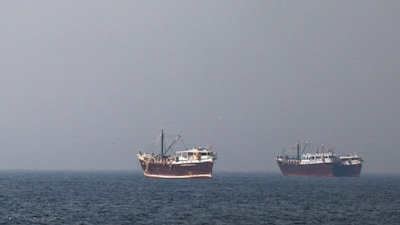 Boats in the Strait of Hormuz amid the US-Israeli conflict with Iran, as seen from Musandam, Oman. (IMAGE: REUTERS)
